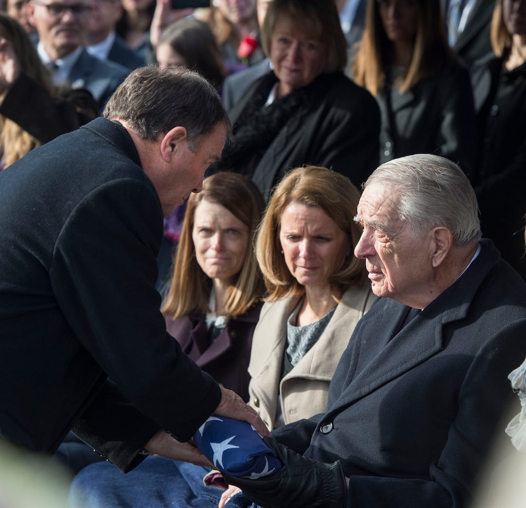 Steve Griffin  |  The Salt Lake Tribune

Gov. Gary Herbert, left, presents Myron Walker with the American Flag that was draped over the casket of his wife and former Gov. Olene Walker during graveside services Dec. 4, 2015. Myron Walker called the “first lad” when his wife became Utah’s governor in 2003. Myron Walker died July 30, 2018. He was 90.
