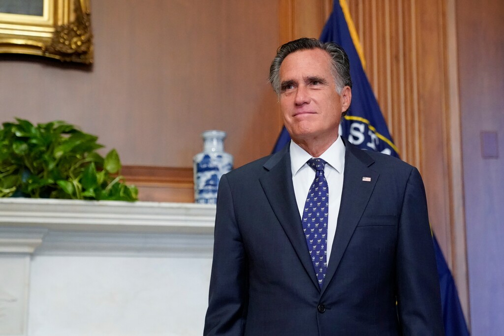 Sen. Mitt Romney, R-Utah, meets with Judge Amy Coney Barrett, President Donald Trumps nominee for the U.S. Supreme Court, not shown, on Capitol Hill in Washington, Wednesday, Sept. 30, 2020. (Erin Scott/Pool via AP)