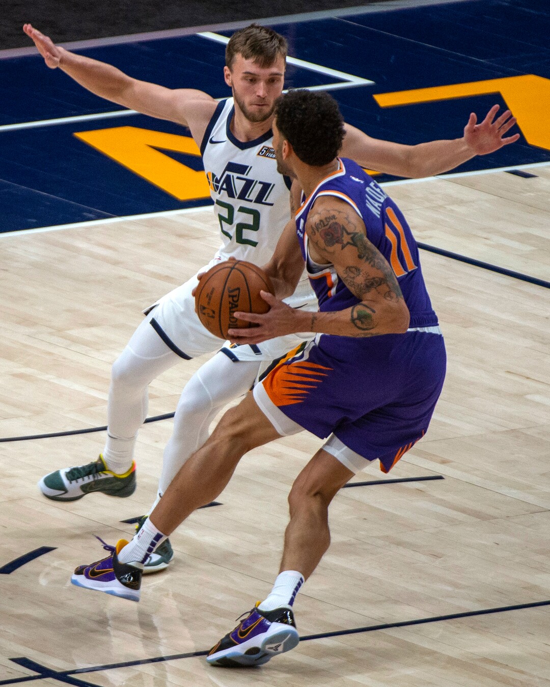 (Rick Egan | The Salt Lake Tribune)  Utah Jazz guard Jake Toolson (22) guards Phoenix Suns forward Abdel Nader (11), in preseason NBA action between Utah Jazz and Phoenix Suns at Vivint SmartHome Area, on Saturday, Dec. 12, 2020.