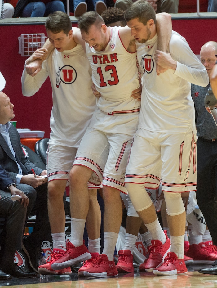 (Rick Egan  |  The Salt Lake Tribune)  Utah Utes forward David Collette (13) leaves the game, early in the first half, in PAC-12 basketball action at the Jon M. Huntsman Center, Saturday, March 3, 2018.