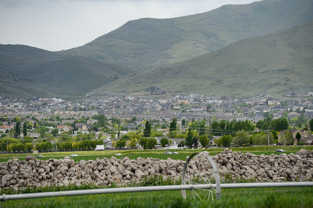 (Francisco Kjolseth  |  The Salt Lake Tribune)  Development continues to creep up against the Oquirrh foothills along the southwest bench in Salt Lake County near Herriman on Friday, May 17, 2019. A flurry of land use planning is underway covering SLCounty's west side, as growth pressure only gets more intense and we head toward a future of wall-to-wall city.