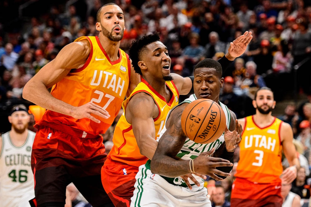 (Trent Nelson | The Salt Lake Tribune)  Boston Celtics guard Terry Rozier (12) defended by Utah Jazz center Rudy Gobert (27) and Utah Jazz guard Donovan Mitchell (45). Utah Jazz vs. Boston Celtics, NBA basketball in Salt Lake City on Friday Nov. 9, 2018.