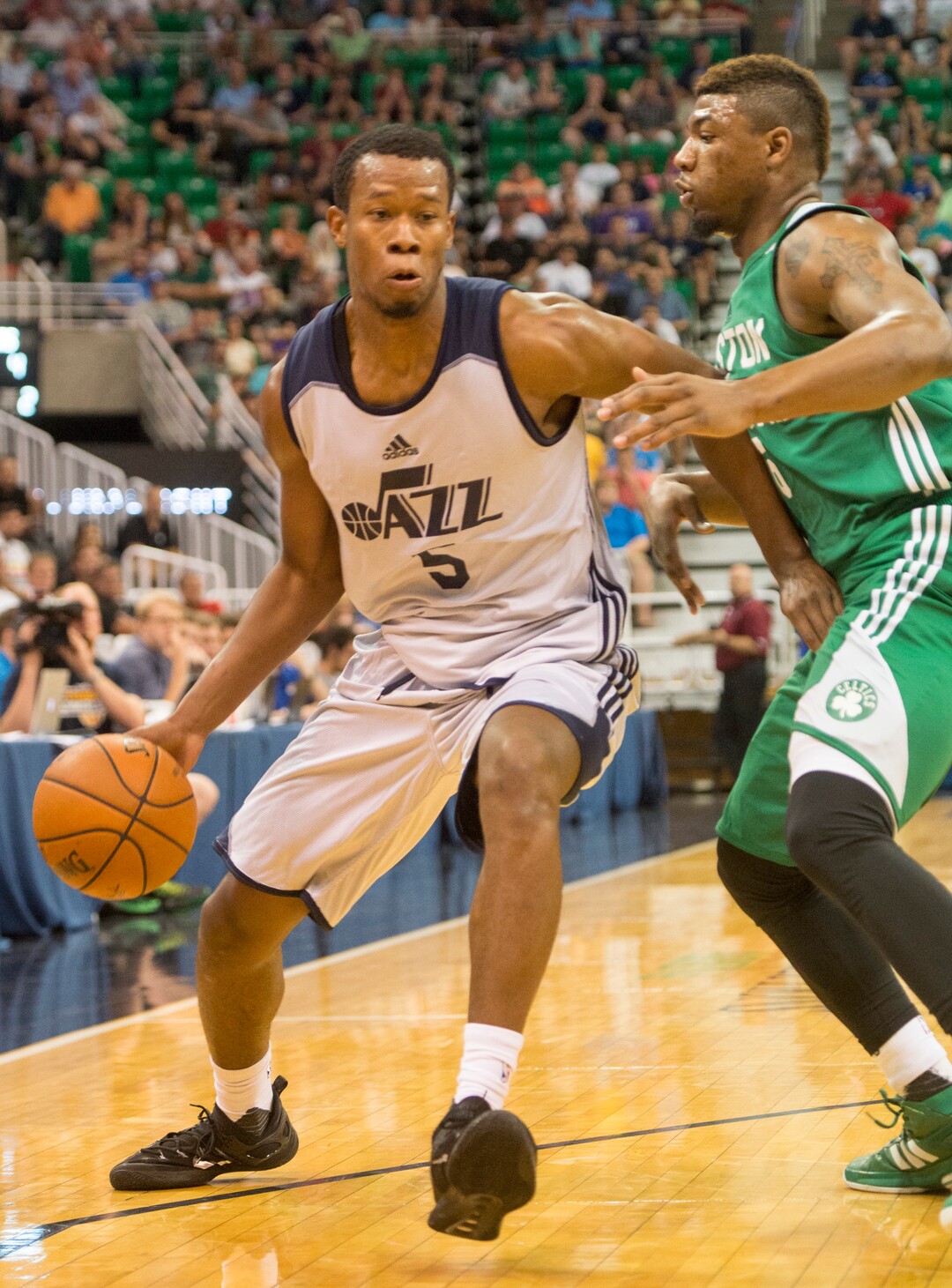Rick Egan  |  The Salt Lake TribuneUtah Jazz guard Rodney Hood (5) goes one-on-one with Boston Celtics guard Marcus Smart (36), in Utah Jazz Summer League action, Utah Jazz vs. The Boston Celtics, at EnergySolutions Arena, Monday, July 6, 2015. Hood led the scoring for the Jazz with 23 points.