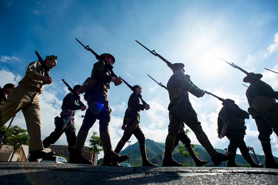 (Rick Egan  |  The Salt Lake Tribune)      Members of the Utah Military History Group march to the Fort Douglas Cemetery for the Memorial Day observance Monday, May 28, 2018.
