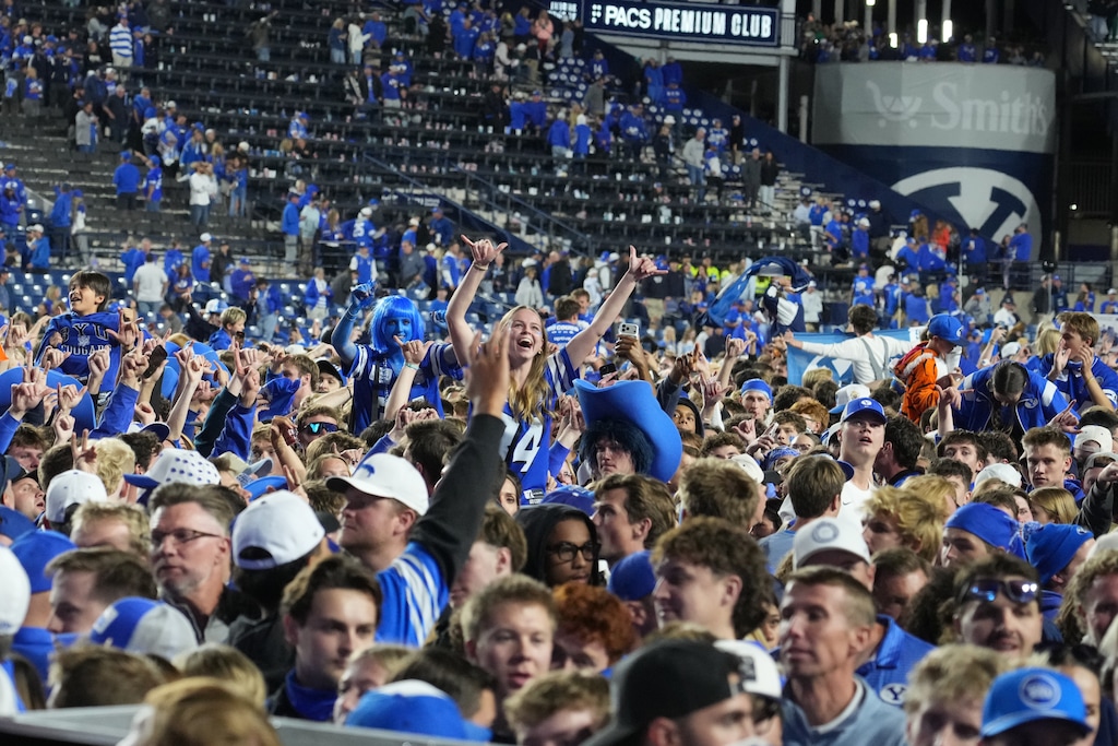 (George Frey | Special to The Tribune) BYU fans celebrate BYU’s win over Notre Dame at LaVell Edwards Stadium on October 17, 2026.