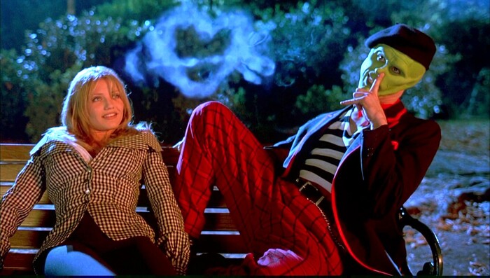 (Courtesy New Line Cinema) Cameron Diaz (left), in her first movie, plays a jazz singer who falls for The Mask (Jim Carrey), the outlandish alter ego of shy Stanley Ipkiss, in the 1994 comedy "The Mask."