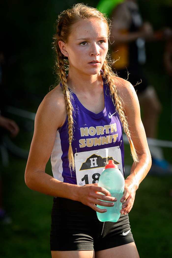 (Trent Nelson  |  The Salt Lake Tribune)  North Summit runner Sadie Sargent cools down after taking first in the Highland Invitational high school cross country meet Thursday August 17, 2017. Sargent is by far the fastest runner in Class 2A. She owns the 2A state record for fastest time at the state meet for a freshman, sophomore and junior, and she'll try to make it four for four later this year.