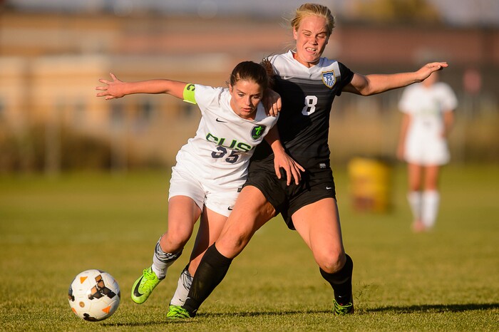 (Trent Nelson | The Salt Lake Tribune) Syracuse's Caroline Stringfellow (35) and Pleasant Grove's Mariah Lucas (8) in the Class 6A girls' soccer state quarterfinal between Pleasant Grove and Syracuse, in Syracuse Thursday October 12, 2017.