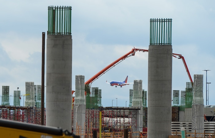 (Francisco Kjolseth  |  The Salt Lake Tribune)  The Salt Lake City Department of Airports gives a tour of the progress being made to replace the three aging terminals with a single central terminal building. Over time, the existing terminal, parking garage and concourses will be completely demolished and replaced with an estimated completion date of 2025.