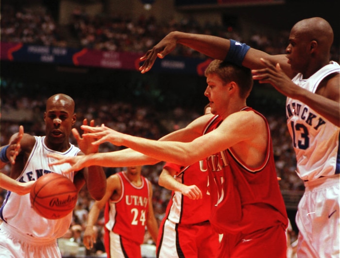 (Trent Nelson  |  Tribune file photo)  Kentucky's Heshimu Evans and Nazr Mohammed (right) pressure the ball out of Utah's Hanno Mottola's hands in the 1998 championship game at the Alamodome in San Antonio, Texas.