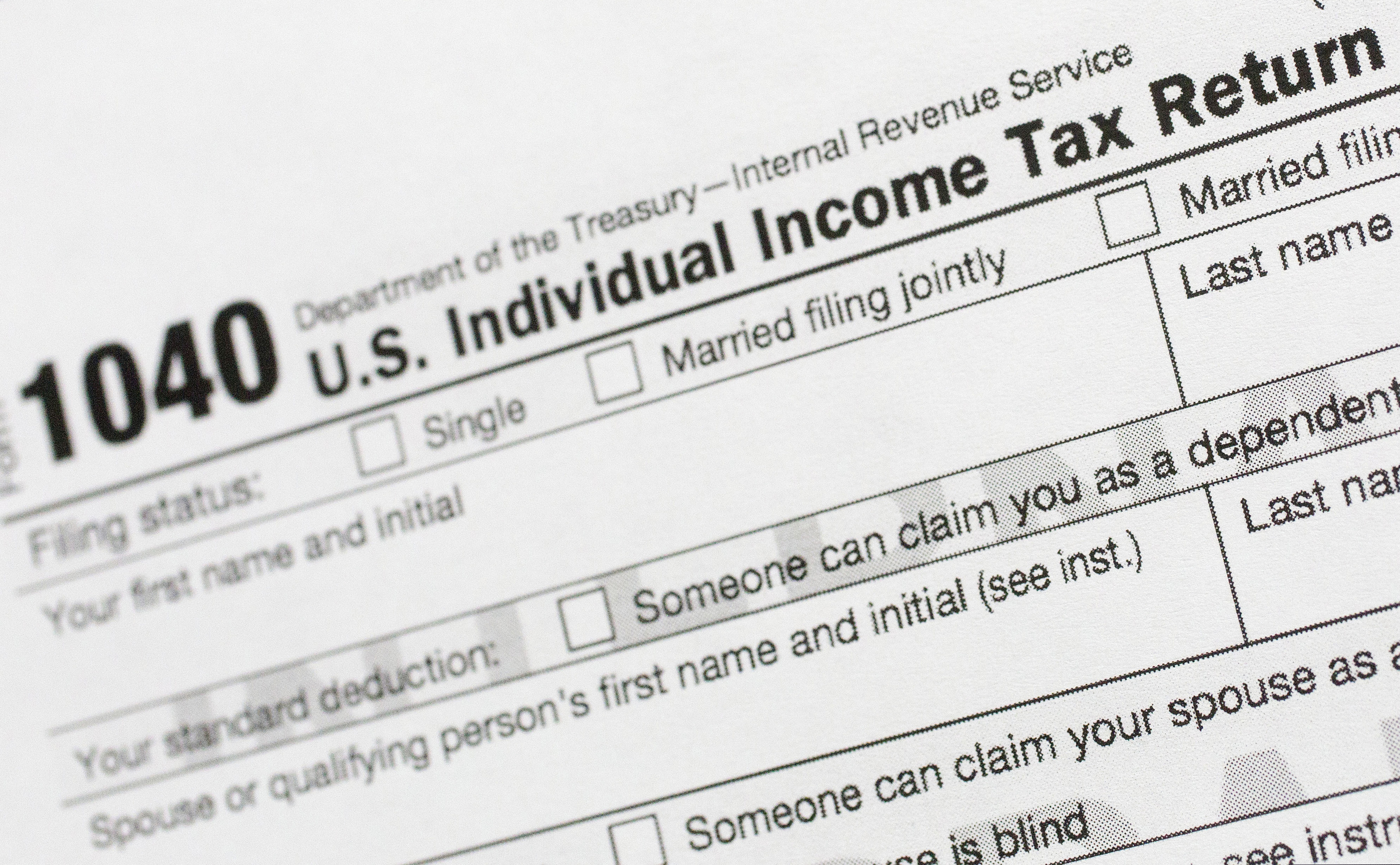 This July 24, 2018 file photo shows a portion of the 1040 U.S. Individual Income Tax Return form. The IRS began accepting and processing tax returns for individuals on Monday, Jan. 27, 2020. (AP Photo/Mark Lennihan)
