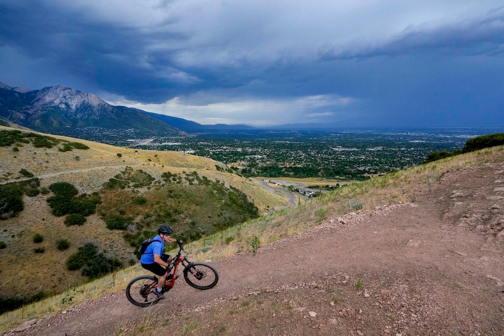 (Francisco Kjolseth | The Salt Lake Tribune) Mount Olympus, as seen from the Parley's Pointe Trail, where Mike Coleman, of Millcreek, crests a switchback on Wednesday, Aug. 10, 2022. An 18-year-old was found shot to death at the Mount Olympus trailhead early Saturday, Aug. 3, 2024.