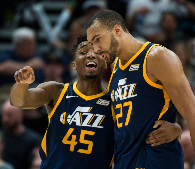 (Rick Egan  |  The Salt Lake Tribune)    Utah Jazz guard Donovan Mitchell chats with Utah Jazz center Rudy Gobert, during a break in the action, in NBA action between the Utah Jazz and the Orlando Magic,  Monday, March 5, 2018.