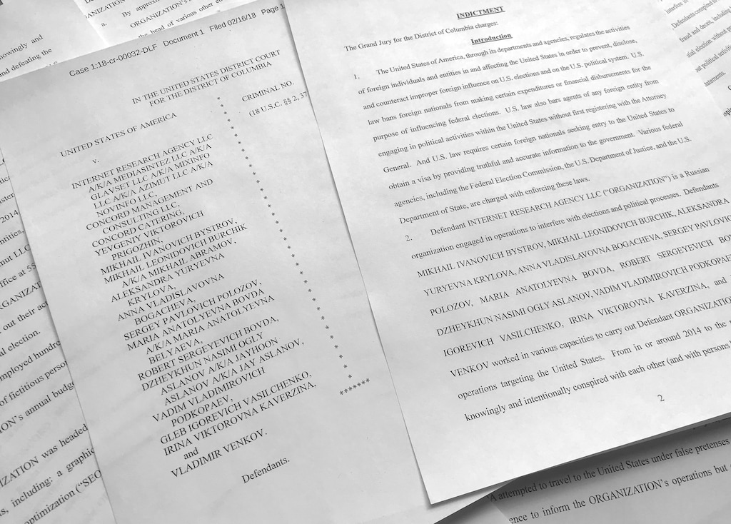 (Jon Elswick | AP file photo) In this March 15, 2018, photo, a portion of the Feb. 16, 2018 indictment against Russia's Internet Research Agency is photographed in Washington.