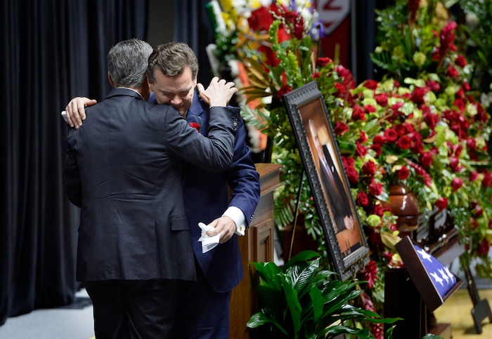Scott Sommerdorf | The Salt Lake Tribune
Ambassador Jon Huntsman Jr, left, hugs his brother Peter Huntsman, after Peter had spoken at the funeral services for Jon M. Huntsman, Sr., Saturday, February, 10, 2018. 
