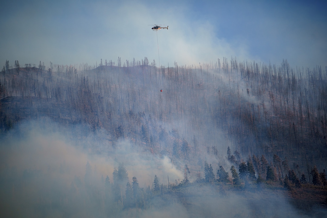 (Trent Nelson  |  The Salt Lake Tribune) Pilots make drops as the Parleys Canyon Fire burns on Saturday, Aug. 14, 2021.