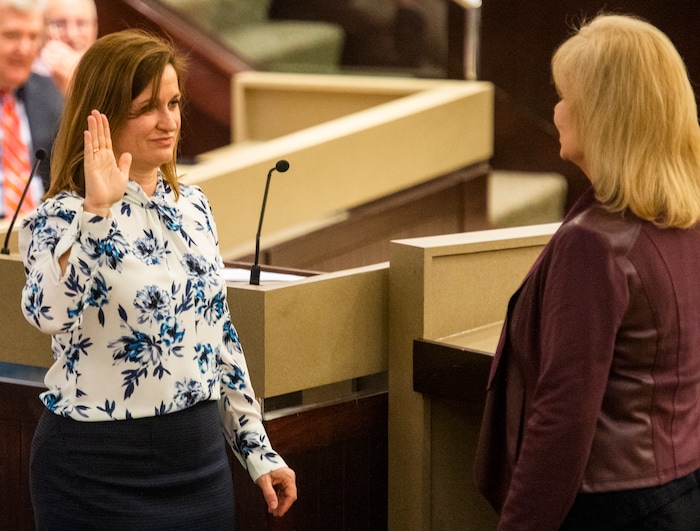 (Rick Egan  |  The Salt Lake Tribune)     Jenny Wilson is sworn in as the new Salt Lake County Mayor by Salt Lake County Clerk, Sherrie Swensen, Tuesday, Jan. 29, 2019.
