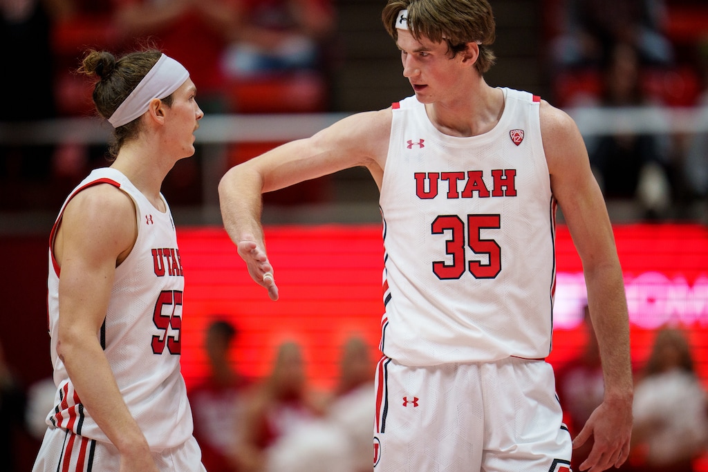 (Trent Nelson | The Salt Lake Tribune) Utah Utes center Branden Carlson (35) celebrates the win with Utah Utes guard Gabe Madsen (55) as the University of Utah hosts Idaho State, NCAA basketball in Salt Lake City on Monday, Nov. 14, 2022. The Utes cruised to a victory over St. Thomas-Minnesota on Saturday.