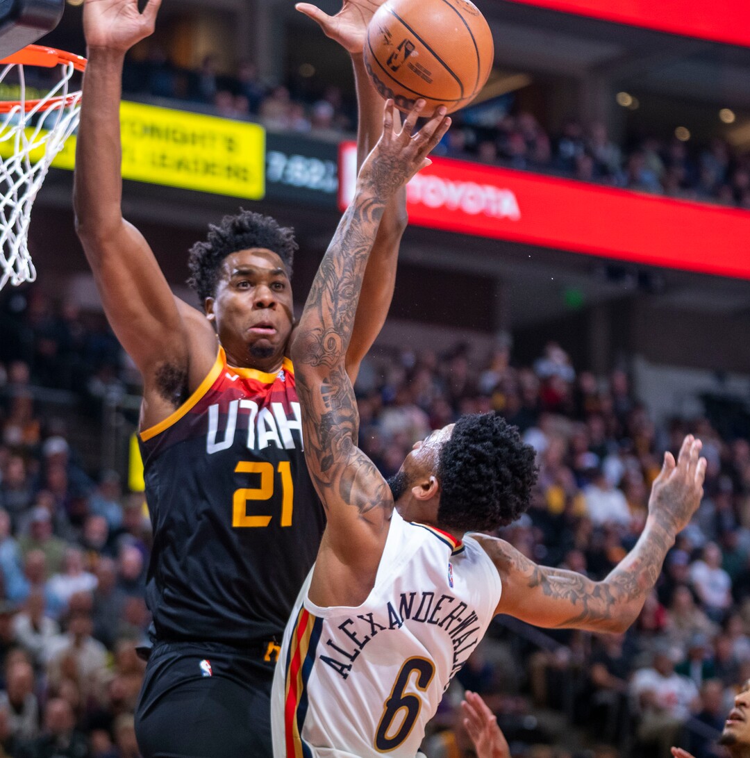(Rick Egan | The Salt Lake Tribune) New Orleans Pelicans guard Nickeil Alexander-Walker (6) shoots over Utah Jazz center Hassan Whiteside (21), in NBA action between the Utah Jazz and the New Orleans Pelicans, at Vivint Arena, in Salt Lake City, on Friday, Nov. 26, 2021.
