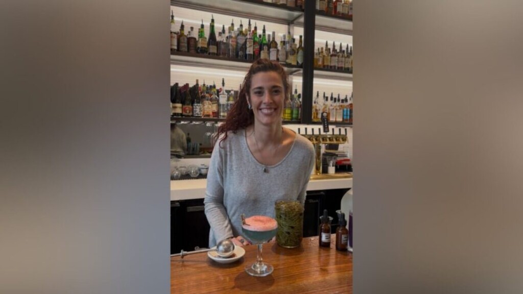 (Mariah Maynes | Great Salt Lake Collaborative) Post Office Place Bartender April Long poses with "What Remains," a Great Salt Lake-inspired cocktail she created for this year's Salt Lake Magazine Farm-to-Glass Cocktail Content.