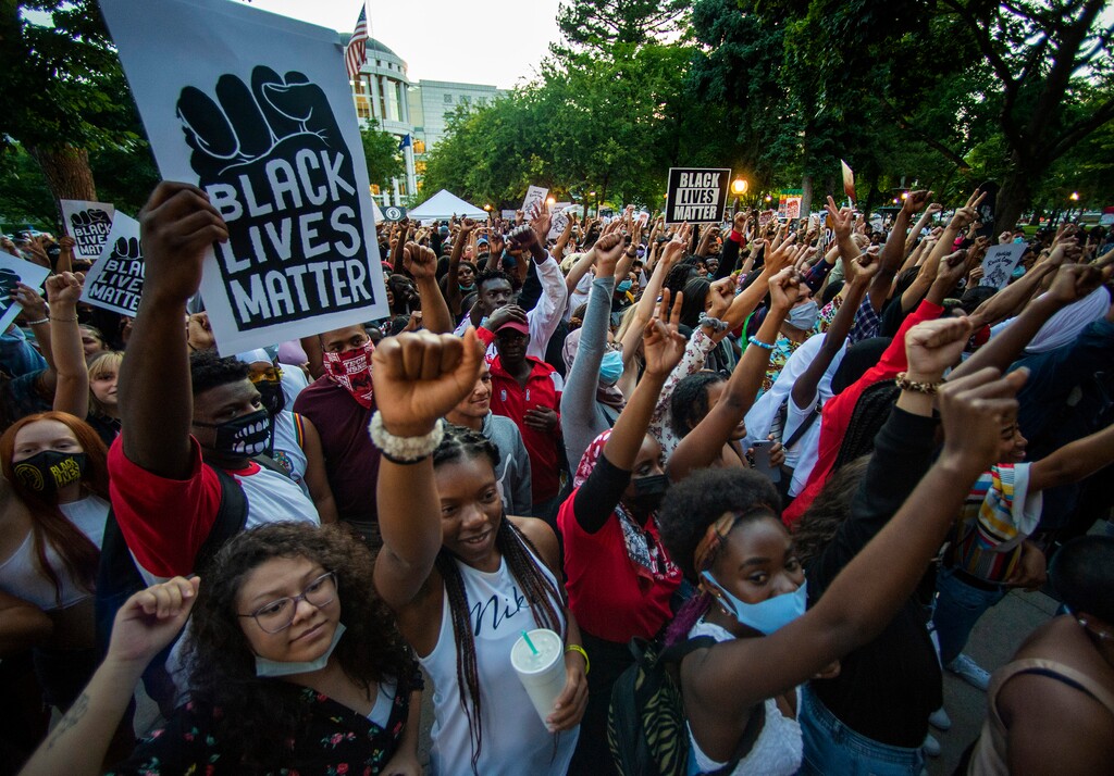 (Rick Egan  |  The Salt Lake Tribune)  The crowd cheers as Juneteenth celebration continued into the evening at Washington Square in Salt Lake City, on Friday, June 19, 2020. Juneteenth celebrations will continue over Father's Day weekend in 2024 in Utah.
