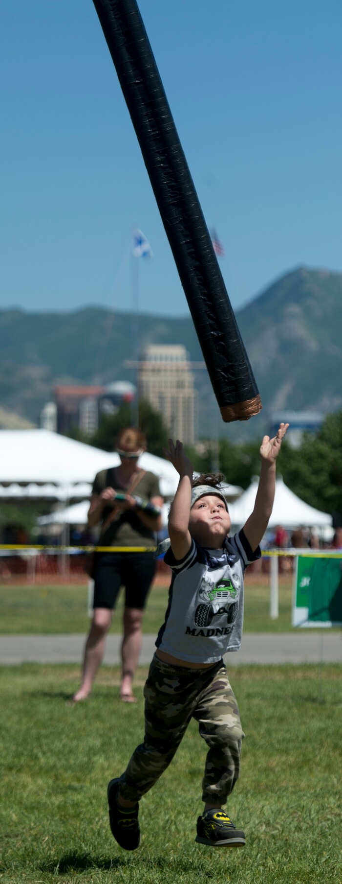 (Rick Egan  |  The Salt Lake Tribune)      Jack Christensen, 6, West Jordan, tosses the Caber, at the 44th annual Utah Scottish Festival and Highland Games at the Utah State Fairgrounds, Sunday, June 10, 2018.