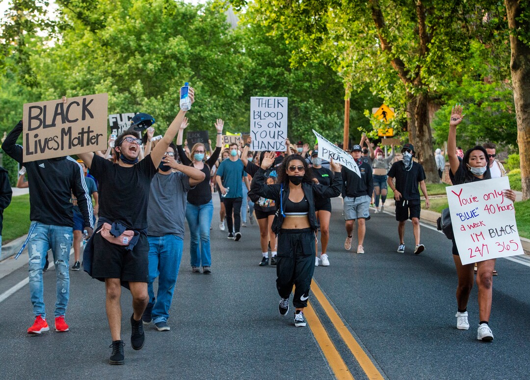 (Rick Egan  |  The Salt Lake Tribune) Protesters march down from Capitol Hill during a George Floyd demonstration, June 3, 2020.