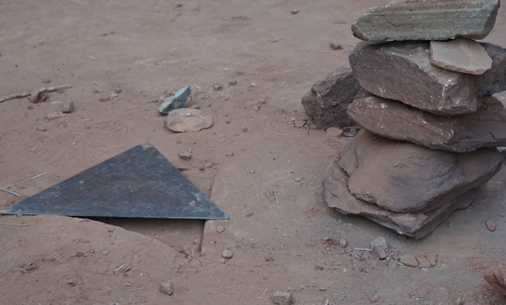 (Zak Podmore | The Salt Lake Tribune) After disappearing sometime Friday night, the triangular top of the now-famous obelisk in San Juan County and a hole in the ground were all that was left of what quickly became an international fixation. November 28, 2020.
