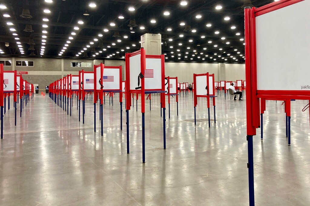 (Piper Blackburn | AP photo)
This June 22 photo shows voting stations set up for the primary election at the Kentucky Exposition Center in Louisville, Ky. Voting will look a little different this November. States are considering drive-thrus, outdoor polling places and curbside voting as they examine creative ways to safely offer same-day polling places during a pandemic.