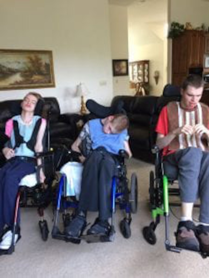 (Courtesy of the Chappell family) Elizabeth, James and Christopher Chappell in July, days before their deaths.