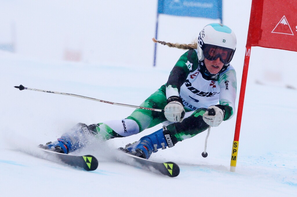 (Charles Krupa  |  AP Photo) In this March 27, 2017, file photo, Foreste Peterson carves a turn on her first run at the women's giant slalom ski race at the U.S. Alpine Ski Championships at Sugarloaf Mountain Resort in Carrabassett Valley, Maine. Peterson thought her ski racing career was over as she finished her senior season at Dartmouth last winter. Out of the blue, the former U.S. ski team member received an offer almost too good to be true: Free housing, travel and coaching to keep her on the slopes. She's a member of Team X, an all-female development ski team based in Park City, Utah. The team currently backs four athletes from four different countries including Peterson, who recently earned a spot in a World Cup giant slalom race this weekend in Killington, Vt.