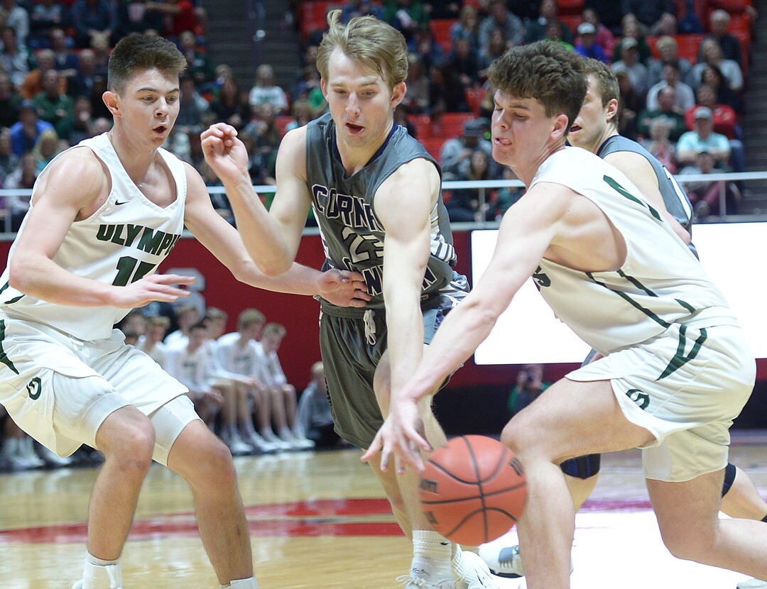 (Leah Hogsten  |  The Salt Lake Tribune) Corner Canyon's Blake Emery (23)tries to steal from Olympus' Jeremy DowDell (00). Olympus defeated Corner Canyon 76-49 to win the 5A High School BoysÕ Basketball Tournament Championship at the Jon M. Huntsman Center in Salt Lake City,  Saturday, March 3, 2018. 