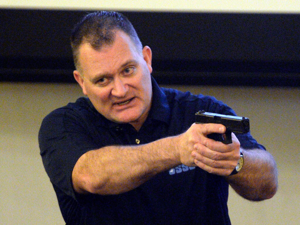 (Rick Egan  | Tribune File Photo) In this Jan. 3, 2014 file photo Clark Aposhian gives instructions during a free concealed firearms permit class to Utah educators at the Salt Lake City Library. Aposhian recently filed a lawsuit against the Department of Justice and Bureau of Alcohol, Tobacco, Firearms and Explosives (ATF) over a ban on bump stocks, a firearm accessory that alters semi-automatic rifles to fire like machine guns. The ban is set to go into place March 26, 2019.