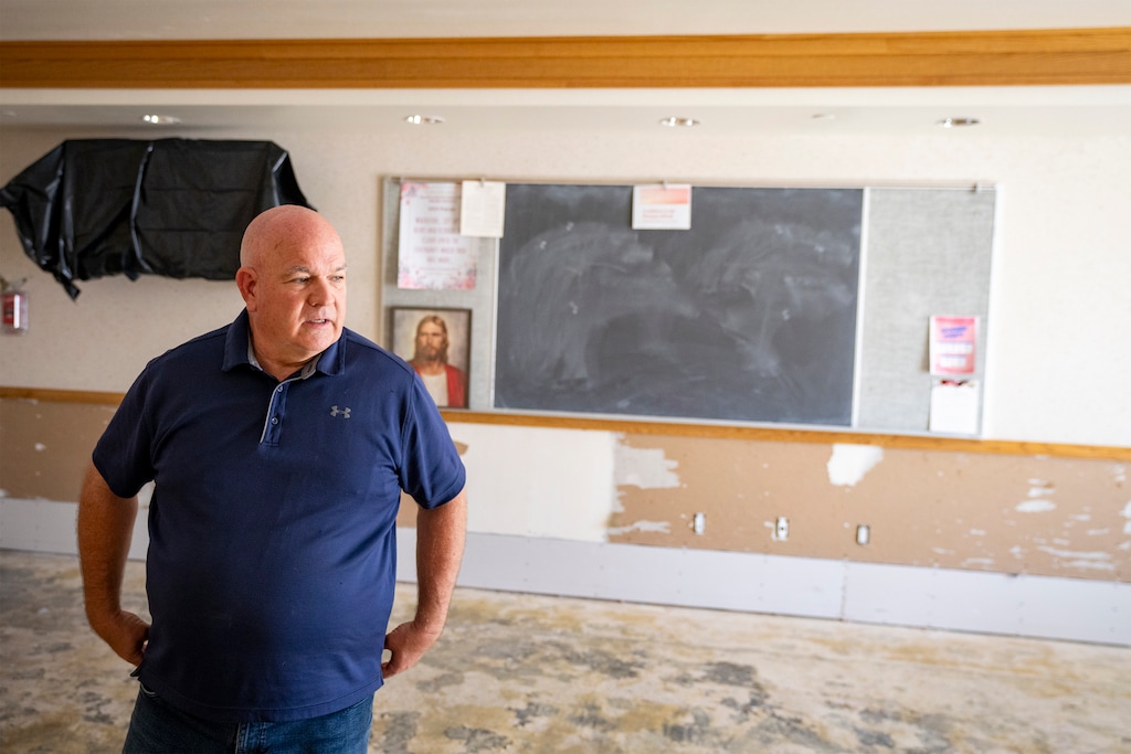 (Rick Egan | The Salt Lake Tribune) Stake President Bryan Hopkins, who is a BYU soil scientist, explains how an August storm caused mud and water to enter a Church of Jesus Christ of Latter-day Saints meetinghouse in Provo.