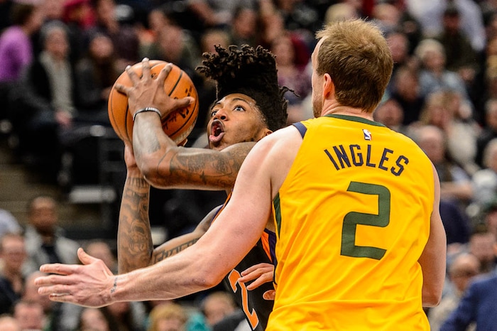 (Trent Nelson | The Salt Lake Tribune)  Phoenix Suns guard Elfrid Payton (2) looks to shoot over Utah Jazz forward Joe Ingles (2) as the Utah Jazz host the Phoenix Suns, NBA basketball in Salt Lake City, Wednesday Feb. 14, 2018.