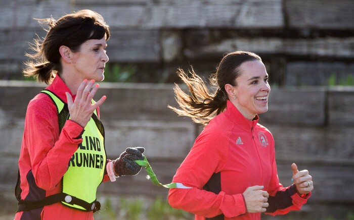 (Rick Egan  |  The Salt Lake Tribune)  Becky Andrews and Alanna Whetsel train for the Boston Marathon by running along David Boulevard in Bountiful, Thursday, March 29, 2018.