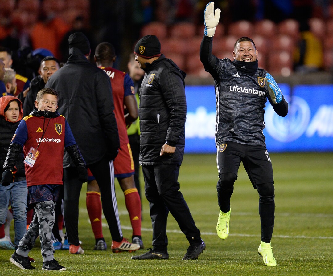 (Francisco Kjolseth  |  The Salt Lake Tribune)  Real Salt Lake goalkeeper Nick Rimando (18) dances with the fans after a 2-1 win as Real Salt Lake and the Portland Timbers played in their first MLS playoff game at Rio Tinto Stadium in Sandy, Utah on Saturday, Oct. 19, 2019.