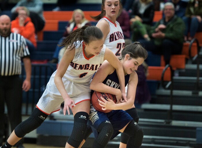 (Scott Sommerdorf   |  The Salt Lake Tribune)   Brighton's Annabelle Ebelling, left, and Skyline's Amit Lustgarten grapple for a rebound tat was later called a jump ball during second half play. Skyline defeated Brighton 66-33, Friday, January 5, 2018.
