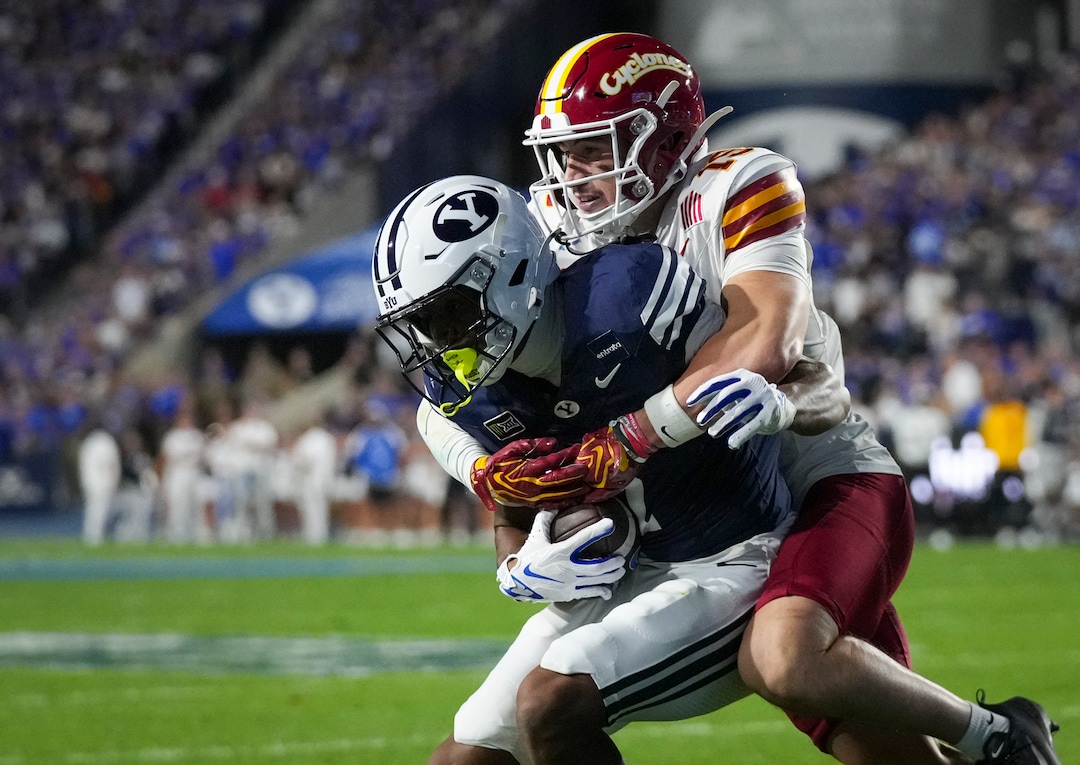(Bethany Baker  |  The Salt Lake Tribune) Iowa State Cyclones safety Eddie Lemos (19) tackles BYU Cougars wide receiver Legend Glasker (1) during the game between the BYU Cougars and the Iowa State Cyclones in Provo on Friday, Oct. 9, 2026.
