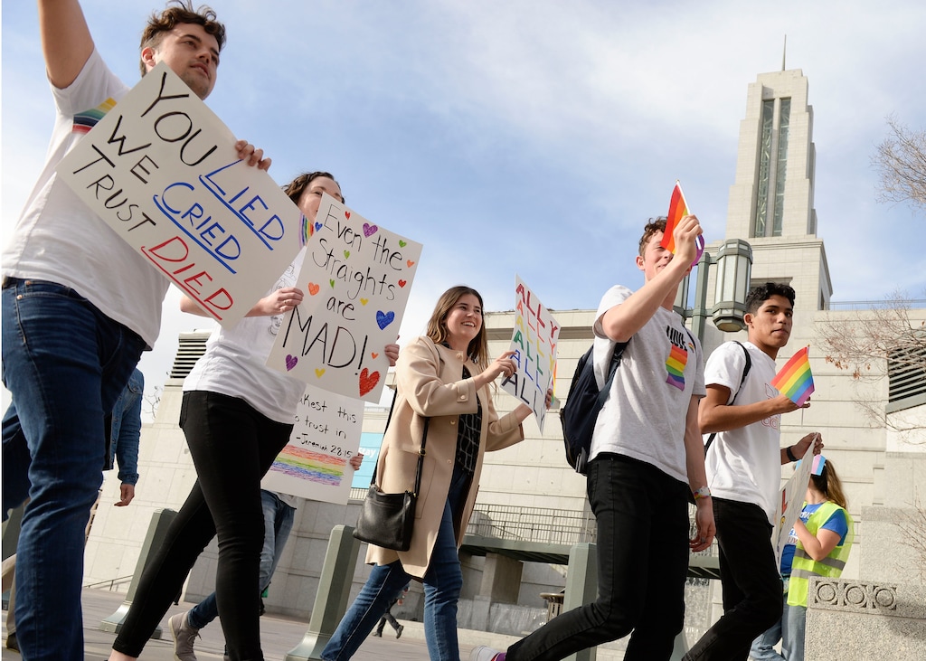 (Leah Hogsten | Tribune file photo) Brigham Young University LGBTQ students took their concerns about the school's policy reversal regarding romantic behavior by same-sex couples to The Church of Jesus Christ of Latter-day Saints office building, Mar. 6, 2020. Despite removing the section on "homosexual behavior" from BYU Honor Code last month, The LDS Church has clarified for the first time that same-sex romantic behavior is still "not compatible" with the rules at BYU.