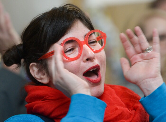 (Leah Hogsten | The Salt Lake Tribune) Melissa Nelson-Stippich of Salt Lake City yells in agreement at Amplifying WomenÕs Voices rally to celebrate International WomenÕs Day at the Utah State Capitol Rotunda, hosted by KRCL Thursday, March 8, 2018.