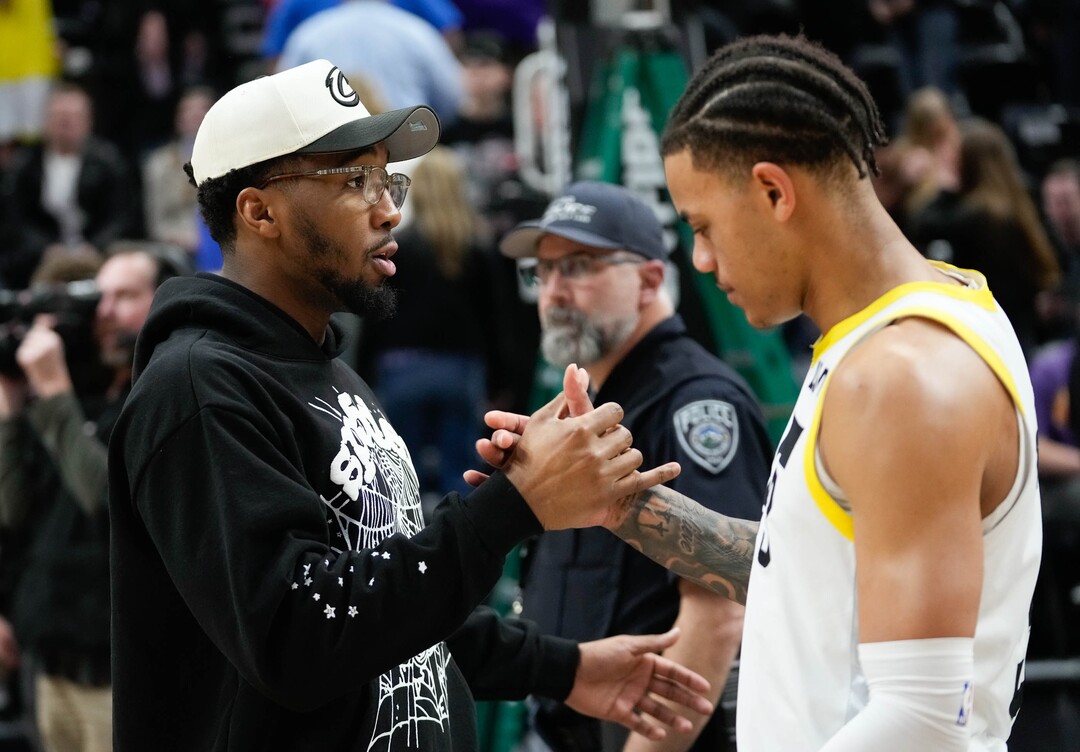 (Francisco Kjolseth  |  The Salt Lake Tribune) Cleveland Cavaliers guard Donovan Mitchell (45) greets Utah Jazz guard Keyonte George (3) following the game as the Utah Jazz took on the Cleveland Cavaliers at the Delta Center in Salt Lake City on Tuesday, April 2, 2024.