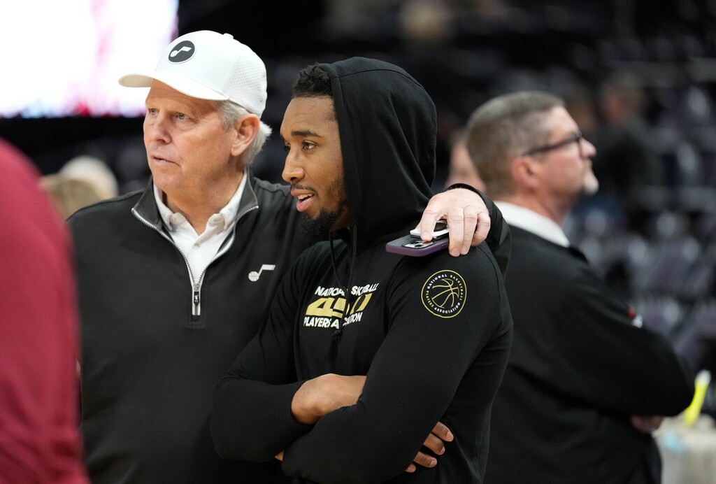 (Francisco Kjolseth  |  The Salt Lake Tribune) Former Utah Jazz player Donovan Mitchell, speaks with CEO of the Utah Jazz Danny Ainge as he returns to Utah prior to the Utah Jazz game against the Cleveland Cavaliers at the Delta Center in Salt Lake City on Tuesday, April 2, 2024.