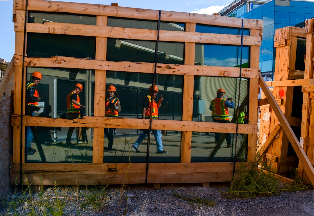 Leah Hogsten  |  The Salt Lake Tribune Members of the media tour Salt Lake City International Airport expansion project construction site, Monday, Oct. 22, 2018. The first phase construction of the $3.6 billion project is due to open in Fall 2020. Nearing completion is the new concourse for aircraft gates, an enclosed terminal, the steel skeleton of a new "gateway" building, a five-story parking garage and elevated roadways. 