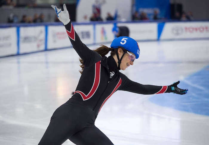 (Scott Sommerdorf   |  The Salt Lake Tribune)   
Katherine Reutter-Adamek celebrates after winning her 1000 meter final and clinching a spot on the Olympic team during day 3 of the U.S. short-track Olympic Team Trials at the Utah Olympic Oval, Sunday, December 17, 2017.  
