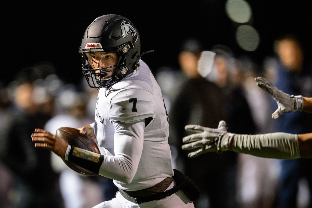 (Trent Nelson  |  The Salt Lake Tribune) Corner Canyon quarterback Cole Hagen runs for a touchdown against Westlake, high school football in Saratoga Springs on Friday Oct. 4, 2019.