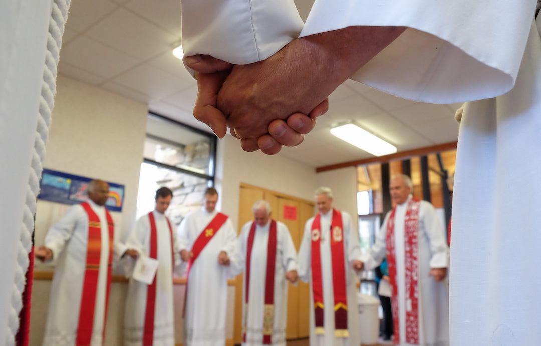 (Francisco Kjolseth  |  The Salt Lake Tribune)  Lutheran and Catholic priests gather at Zion Evangelical Lutheran Church in Salt Lake City for an ecumenical prayer service. 