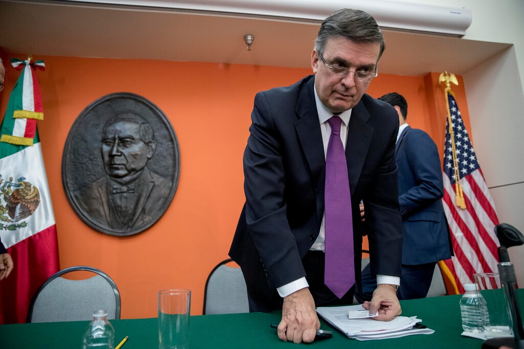 (Andrew Harnik | AP) Mexican Foreign Affairs Secretary Marcelo Ebrard speaks to a reporter following a news conference at the Mexican Embassy in Washington, Monday, June 3, 2019, as part of a Mexican delegation in Washington for talks following trade tariff threats from the Trump Administration.