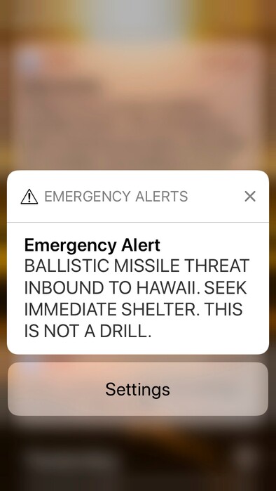 This smartphone screen capture shows a false incoming ballistic missile emergency alert sent from the Hawaii Emergency Management Agency system on Saturday, Jan. 13, 2018. (AP Photo/Caleb Jones)