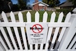 (Francisco Kjolseth | The Salt Lake Tribune) A sign opposes a rezone proposal that would allow more than 20 new housing units, including a number of affordable options, on three now-empty lots along a Glendale street otherwise zoned for single-family homes.